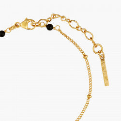WINTER BLOOMING BOUQUET ON A BLACK STONE THIN BRACELET