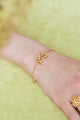 FLAMBOYANT ORCHID AND BRANCH WITH CUT CRYSTAL HEART THIN BRACELET