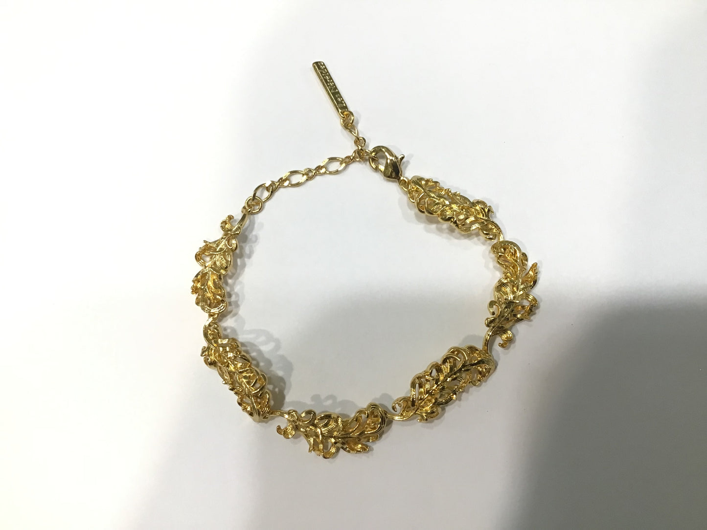 GOLDEN SWAN FEATHER BRACELET